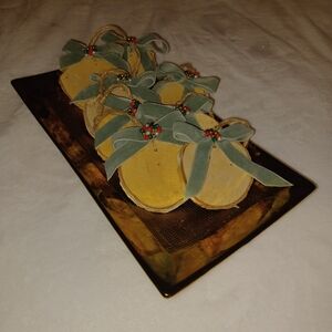 Festive Wooden Ornaments with Green Bows